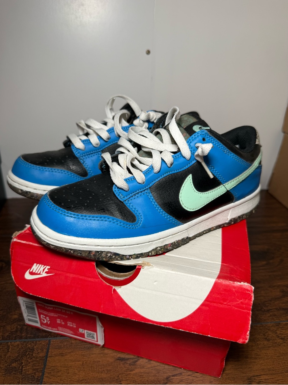Nike Kids Blue and Black Sneakers with Mint Green Swoosh